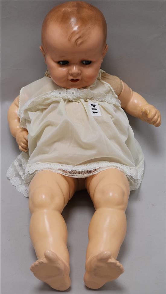 A German composition head and body doll 62cm
